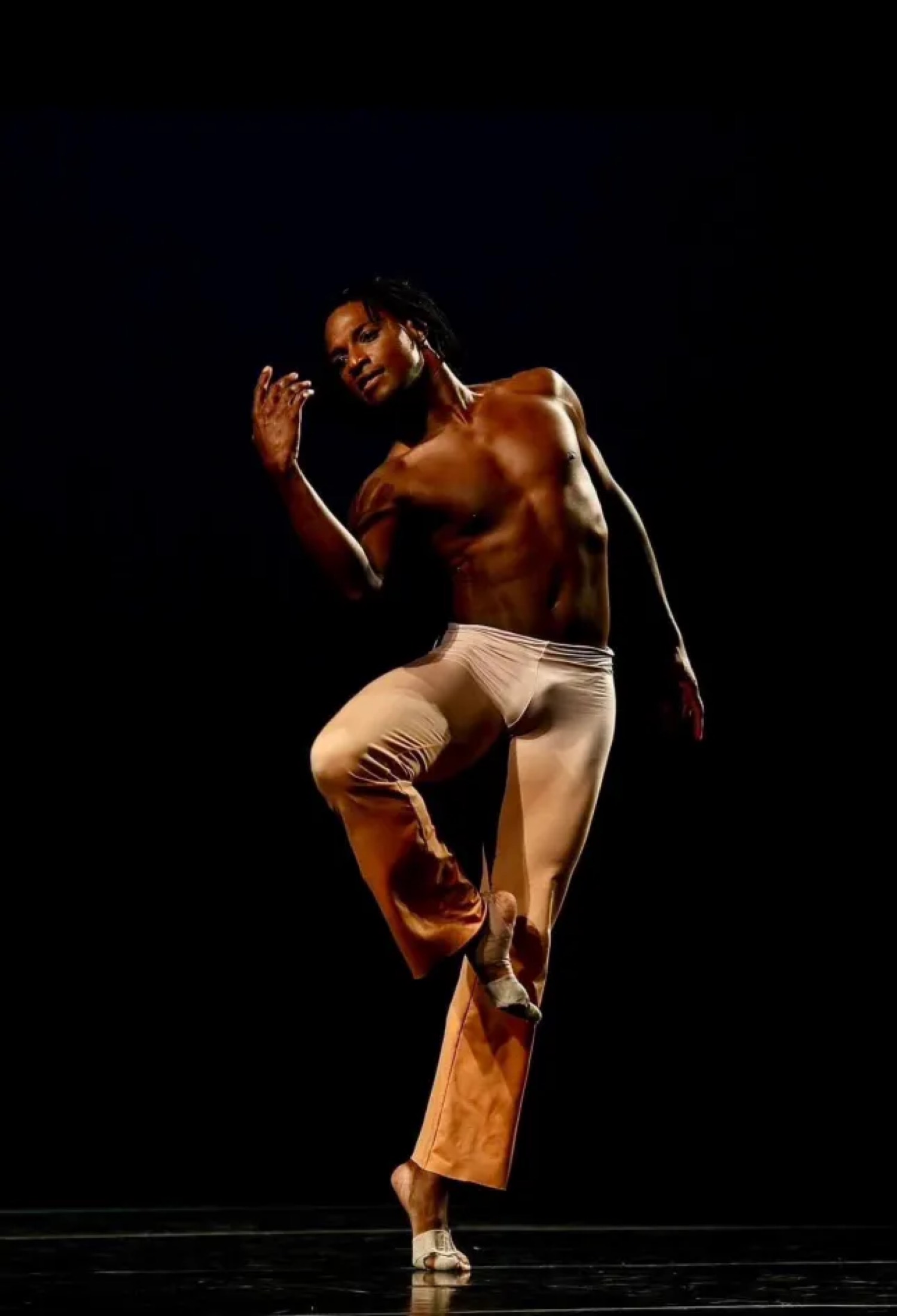 Justin Sears-Watson in powerful dance pose
